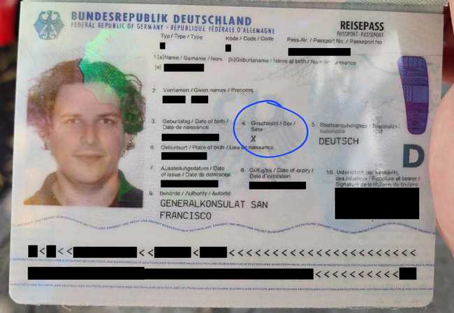 redacted passport with an X gender marker circled