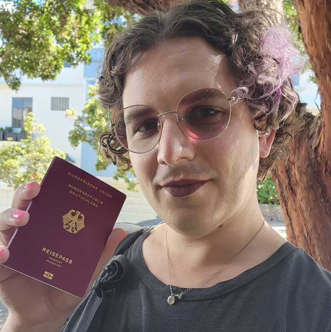 photo of me holding the passport